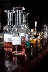 Elixirs, herbal nostrums, and perfumes in vintage bottles
 