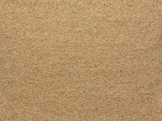 Closeup texture of beige sand