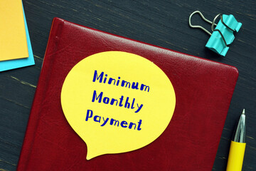 Conceptual photo about Minimum Monthly Payment with handwritten text.