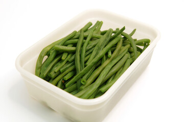 Green beans on a white background