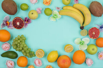 Detox diet and weight loss concept. summer tropical fruits on bright table with place for text, top view, healthy and natural food, source of vitamin C, banner for shop, selective focus