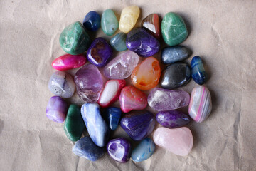 Many different minerals, colored gems with a smooth surface.