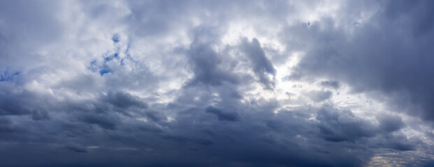 Dramatic sky with dark rainy clouds before the storm. Weather forecast concept.