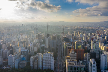 buildings in the Jardins district with Pico do Jaragua in the background, São Paulo, SP, Brazil, sunset with clouds
