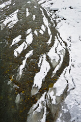 The Black Cheremosh River is covered with ice and snow