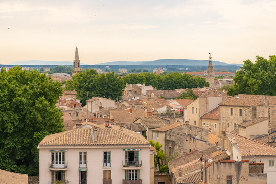 Fototapeta Avignon, aerial view of the city, with typical houses and tiles roofs 
