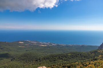 Aerial view to Black sea shoreline from mountain road viewpoint. Crimea