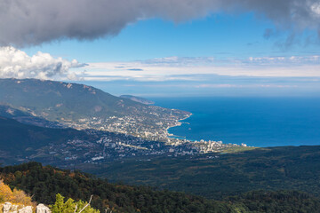Fototapeta na wymiar Aerial view to Yalta town from mountain road viewpoint. Crimea