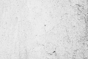 Naklejka premium Texture of a concrete wall with cracks and scratches which can be used as a background