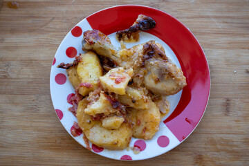 Grilled chicken breast with vegetables. Chicken and potatoes on a plate