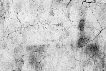 Texture of a concrete wall with cracks and scratches which can be used as a background