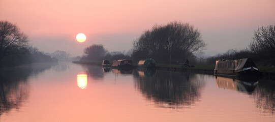 Sunset on the Sharpness to Gloucester ship  Canal from the bridge at Shepherd's Patch.