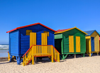 Naklejka premium Colorful beach cabins in Muizenberg, Cape Town Region, South Africa