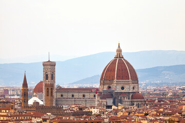 Fototapeta na wymiar Aerial view of the Florence Cathedral, formally the Cattedrale di Santa Maria del Fiore (English: Cathedral of Saint Mary of the Flower).