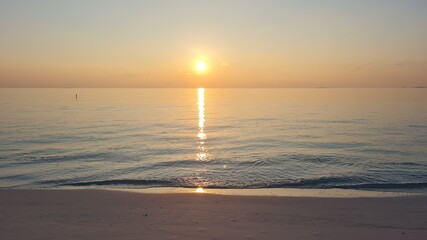Sunrise with clear ocean and no clouds in the maldives