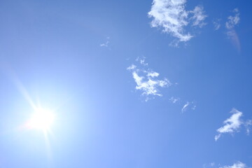 Naklejka na ściany i meble Blue Sky with some clouds and sun