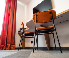 Modern interior of a small hotel room. Designer furniture. Minimalism.