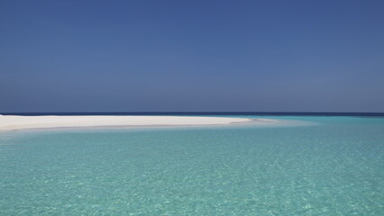 sandbank in turquoise water in th maldives