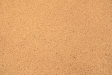 Sand background. Top view. The texture of the sand.