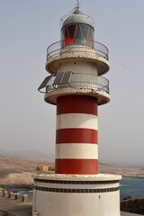 A red and white lighthouse