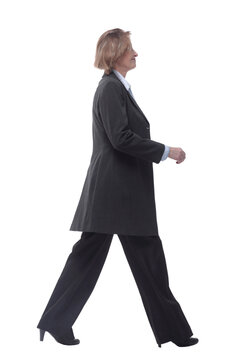 Side View Full Length Profile Shot Of An Elderly Woman Walking Isolated On White Background