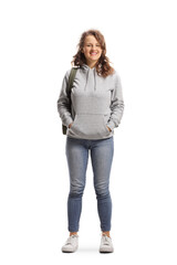 Full length portrait of a female student standing and smiling at the camera - obrazy, fototapety, plakaty