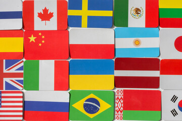 the flags are laid out in even rows. Flags of the countries of the world. Horizontal photo, top view. Concept - use for background.