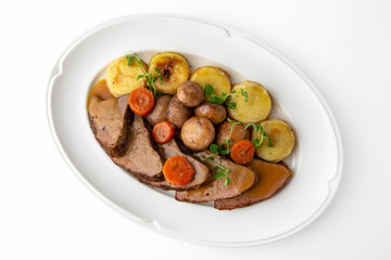 Sliced meat delicacies. Delicious beef, pork and poultry. Banquet festive dishes. Gourmet...