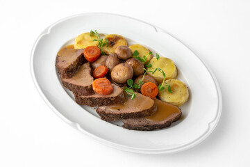 Sliced meat delicacies. Delicious beef, pork and poultry. Banquet festive dishes. Gourmet restaurant menu. White background.