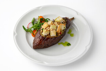 Eggplant baked with tomatoes, zucchini, parmesan. Banquet festive dishes. Gourmet restaurant menu. White background.