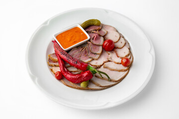 Sliced meat delicacies. Delicious beef, pork and poultry. Banquet festive dishes. Gourmet restaurant menu. White background.