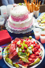 Obraz na płótnie Canvas Beautifully decorated birthday cake on the table for the celebration