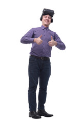 Joyful man giving two thumbs up after using a VR headset