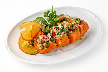 Vegetarian dish, baked carrots baked with bulgur and vegetables. Banquet festive dishes. Gourmet...