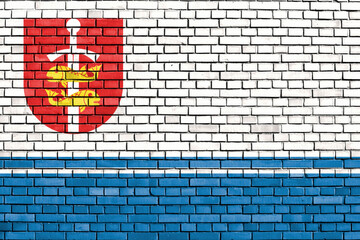 flag of Gdynia painted on brick wall