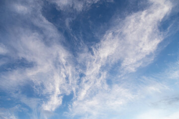 Abstract background clouds texture. Blue sky with white cirrus cloud