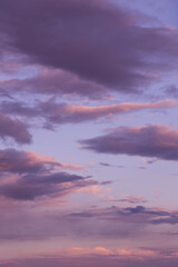 Dramatic sunrise, sunset pink violet blue sky with clouds abstract background texture