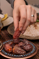 Traditional Turkish dinner include pilaf (boiled rice), lentil soup, Izmir meat balls with potatoes, sarma, kibbeh (aka icli kofte), dried date fruits. Ramadan iftar (evening meal after fasting).