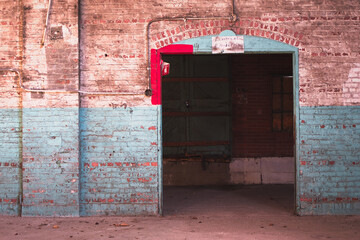 Door opening in an abandoned  factory 