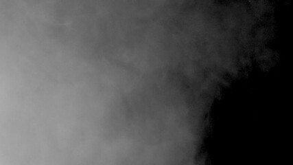 White smoke on a black background slow motion. Start moving the cloud from bottom to top slowly. The concept of transitions for video editing using the alpha channel.