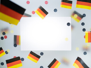 German Unity Day. October 3. National flags on a foggy background. The concept of patriotism,...