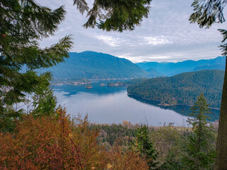 Morning serenity reflected on a calm Burrard Inlet in Fall