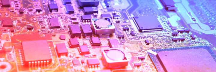 Closeup on electronic board in hardware repair shop, blurred and