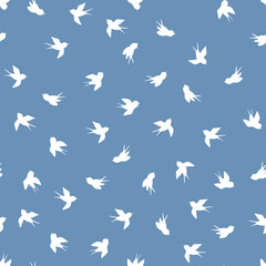 Seamless pattern with white swallow silhouette on blue background. Cute bird in flight. Vector illustration. Doodle style. Design for invitation, poster, card, fabric, textile