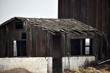wide angle shot of a roof of an old barn in the farm
