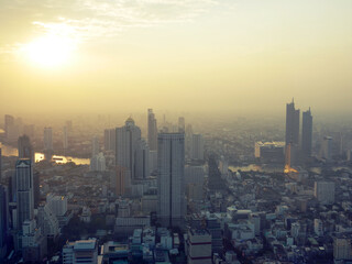Naklejka premium Beautiful sunrise and building in Bangkok, Thailand.