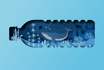 World oceans day concept, the blue whale in a bottle of water. Help to protect animals and the environment, paper illustration, and 3d paper. © Sunset Paper's