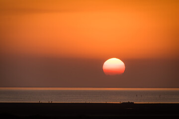 Fototapeta premium Orange Sunset At South Padre Island Texas