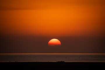 Fototapeta na wymiar Orange Sunset At South Padre Island Texas