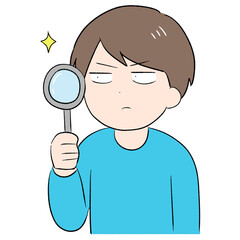 虫眼鏡を持って調べる男性